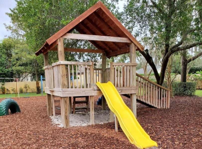 Children's Playground with a yellow slide.